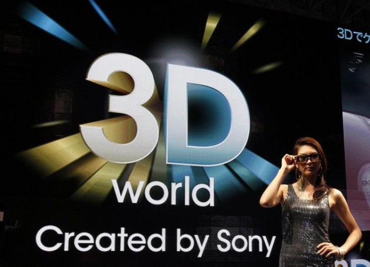 A model poses at Sony's booth to promote its 3D TV sets in Chiba, east of Tokyo,