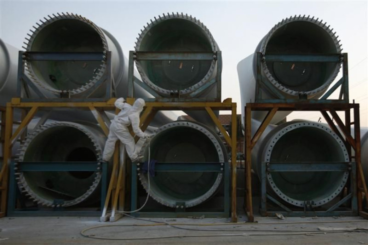 A worker paints wind turbines at China Ming Yang Wind Power Zhongshan Ming Yang electric factory in Zhongshan, southern Chinese province of Guangdong