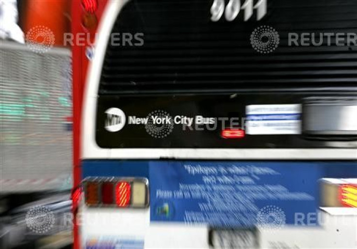 A New York City Metropolitan Transportation Authority (MTA) bus heads west on New York's 42nd Street..