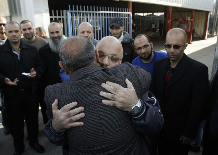 Palestinian Hamas member Attoun is greeted upon his release from an Israeli prison at Qalandiya checkpoint, near Ramallah