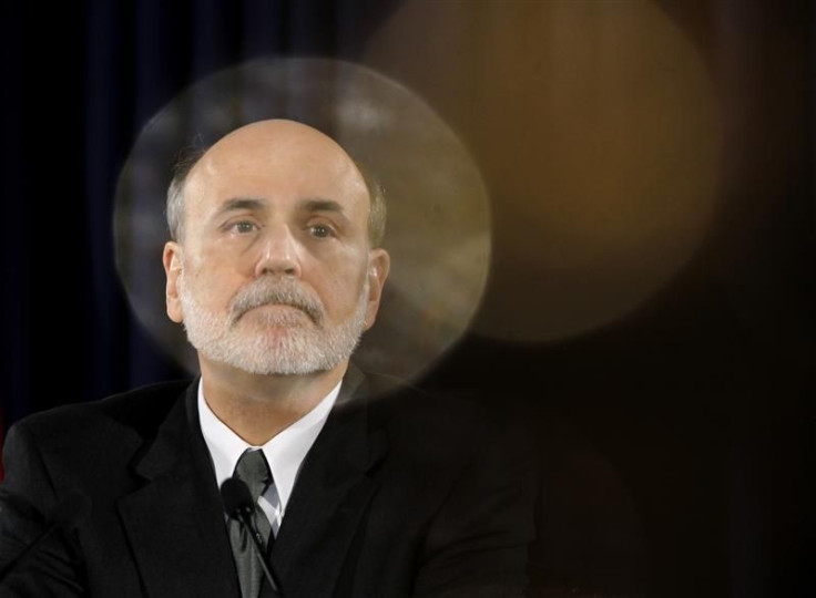 U.S. Federal Reserve Chairman Ben Bernanke pauses during a news conference following a two-day policy session in Washington