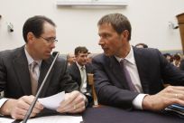 AT&T's chief executive Randall Stephenson and Deutsche Telekom CEO Rene Obermann