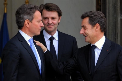 France&#039;s President Sarkozy and Finance and Economy Minister Baroin accompany US Treasury Secretary Geithner at the Elysee Palace in Paris