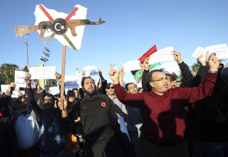 Residents protest against the presence of weapons inside the city of Tripoli