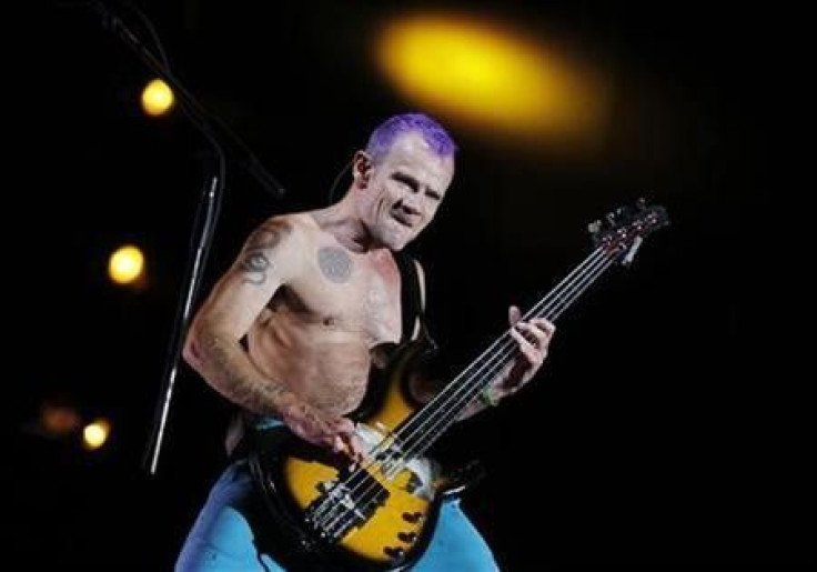 Red Hot Chili Peppers bassist Michael &#039;&#039;Flea&#039;&#039; Balzary performs during their world tour at the National Stadium in Lima