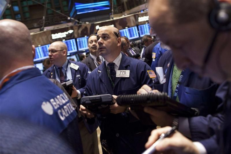 Traders work on the floor of the New York Stock Exchange in New York