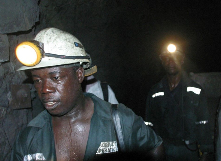 Workers in Abuasi gold mine in Ghana