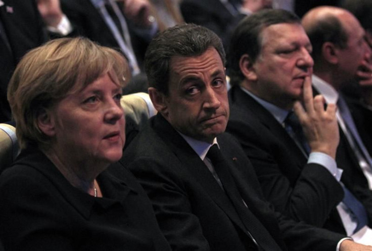 France's President Sarkozy sits next to German Chancellor Merkel and European Commission President Barroso at the EPP congress in Marseille