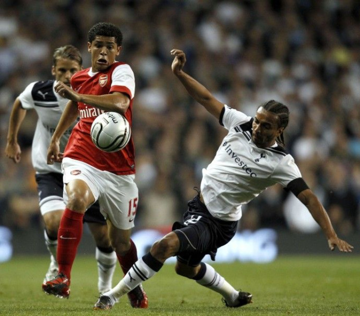Tottenham Hotspur's Assou-Ekotto challenges Arsenal's Denilson during their English League Cup soccer match at White Hart Lane in London on 21/09/2010.