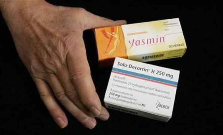 A chemist displays birth control pill 'Yasmin'