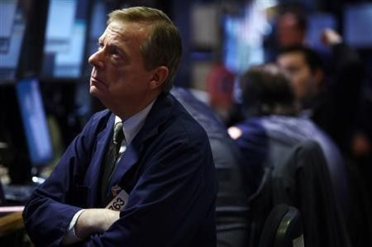 A trader works on the floor of the New York Stock Exchange in New York Dec. 8, 2011.