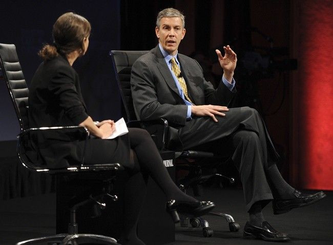 US Secretary of Education Arne Duncan (R) speaks during an onstage interview with Wall Street Journal Deputy Managing Editor Rebecca Blumenstein (L) at the 2010 meeting of the Wall Street Journal CEO Council in Washington, November 16, 2010.