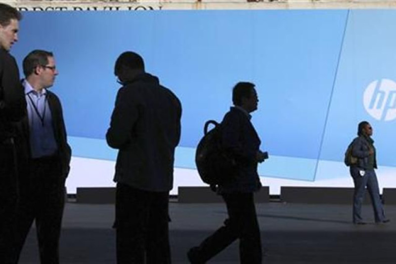 Members of the media and corporate staff wait outside the Herbst Pavilion at the Fort Mason Center for the HP/Palm webOS event in San Francisco