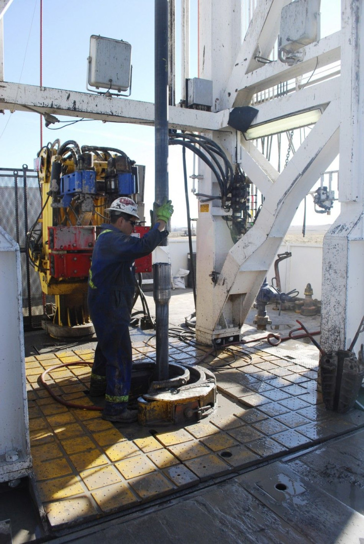 A worker at EnCana&#039;s Frenchie Draw.