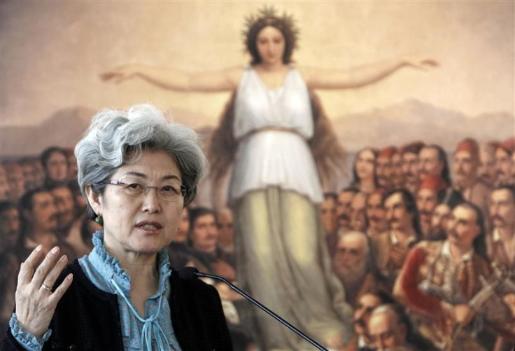 China's Deputy Foreign Minister Fu addresses reporters during a news conference in Athens