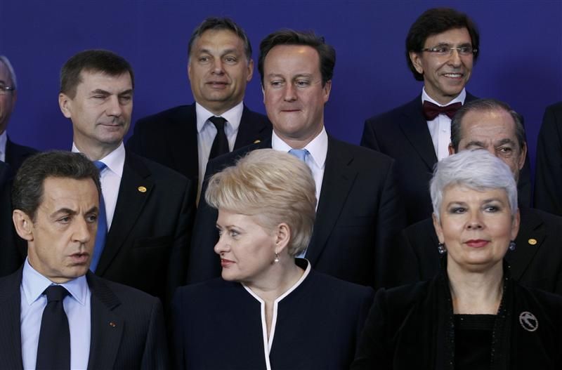 Hungarys Prime Minister Orban and Britains Prime Minister Cameron attend a EU leaders summit in Brussels