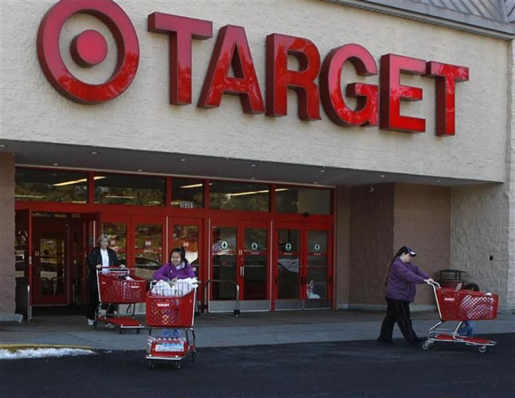 Shoppers exit a Target store with their purchases in Fairfax