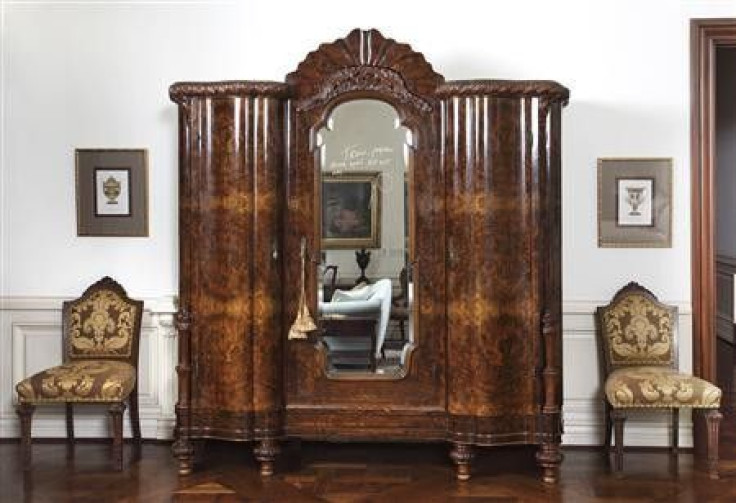 An armoire from the Carrolwood Drive rented home of pop star Michael Jackson is shown with a note written on the glass in this publicity photo