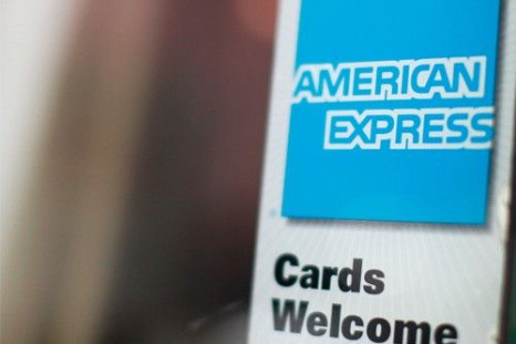 An American Express sign is seen on a restaurant door in New York