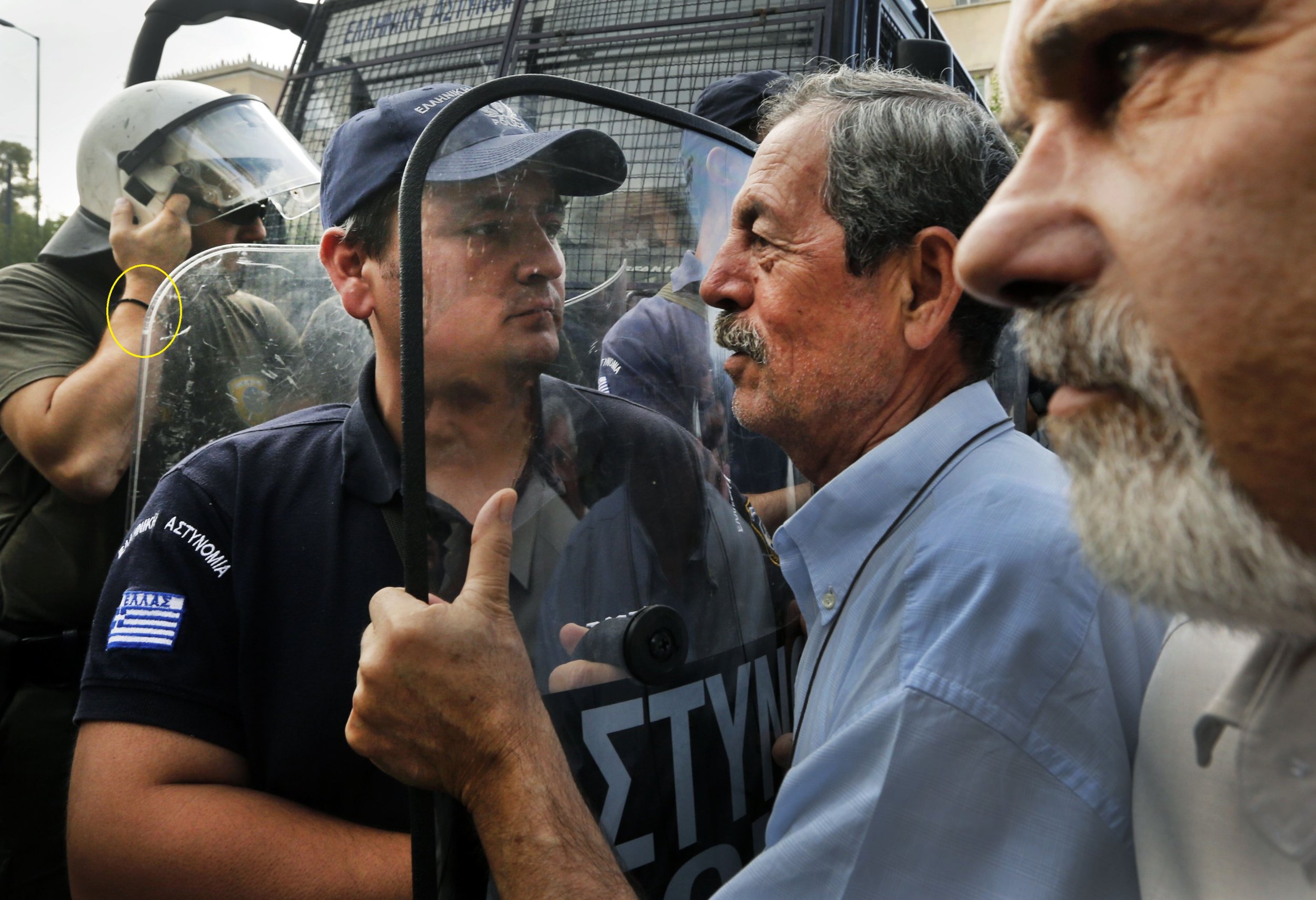Retirees clash with police during demonstrations against austerity measures in Athens October 8.