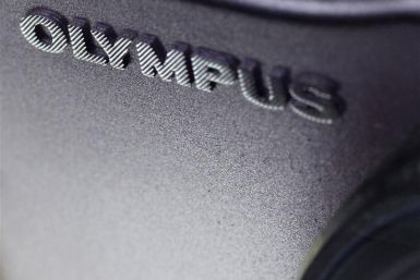 The logo of Olympus is seen on its camera at an electronic shop in Tokyo
