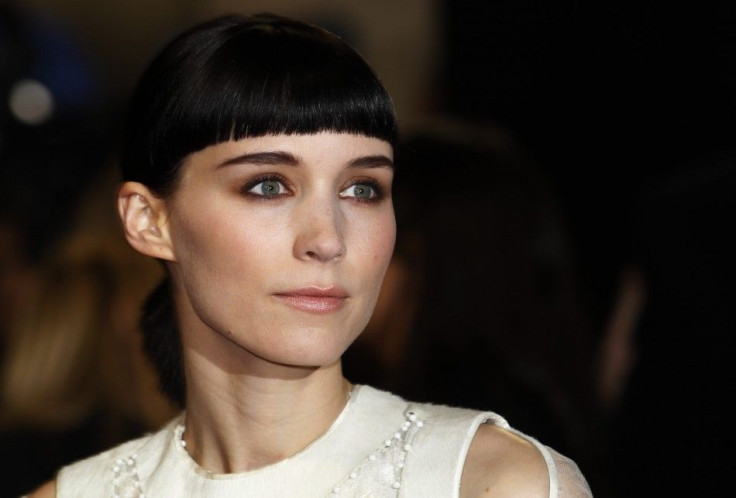 U.S. actor Rooney Mara poses at the world premiere of &quot;The Girl with the Dragon Tattoo&quot; at the Odeon in London