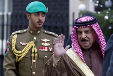 Bahrain's King Hamad bin Isa Al Khalifa waves as he leaves 10 Downing Street in London