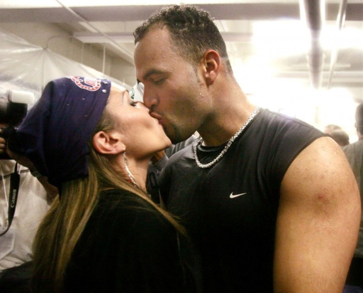 Deidre Pujols kisses her husband Albert Pujols. Photo taken in 2004.