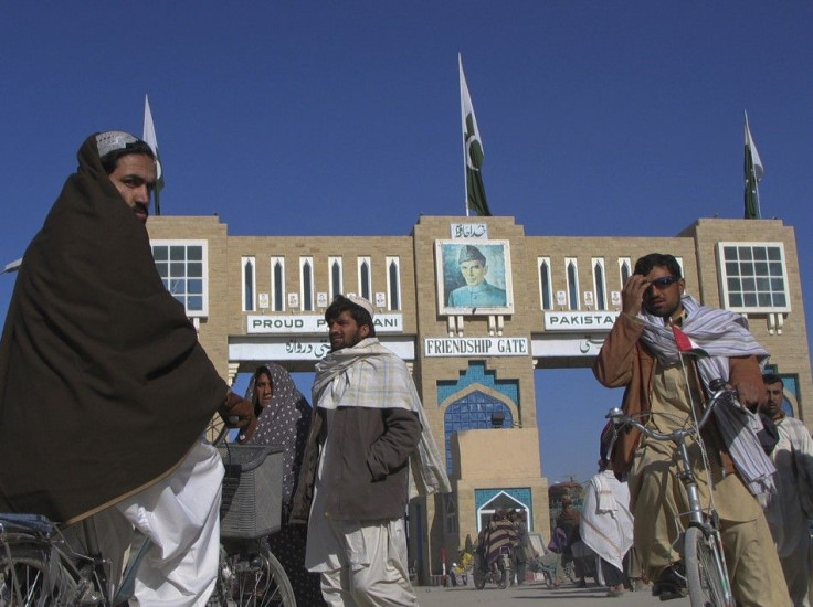 Commuters walk along the Pakistan-Afghanistan border crossing in Chaman