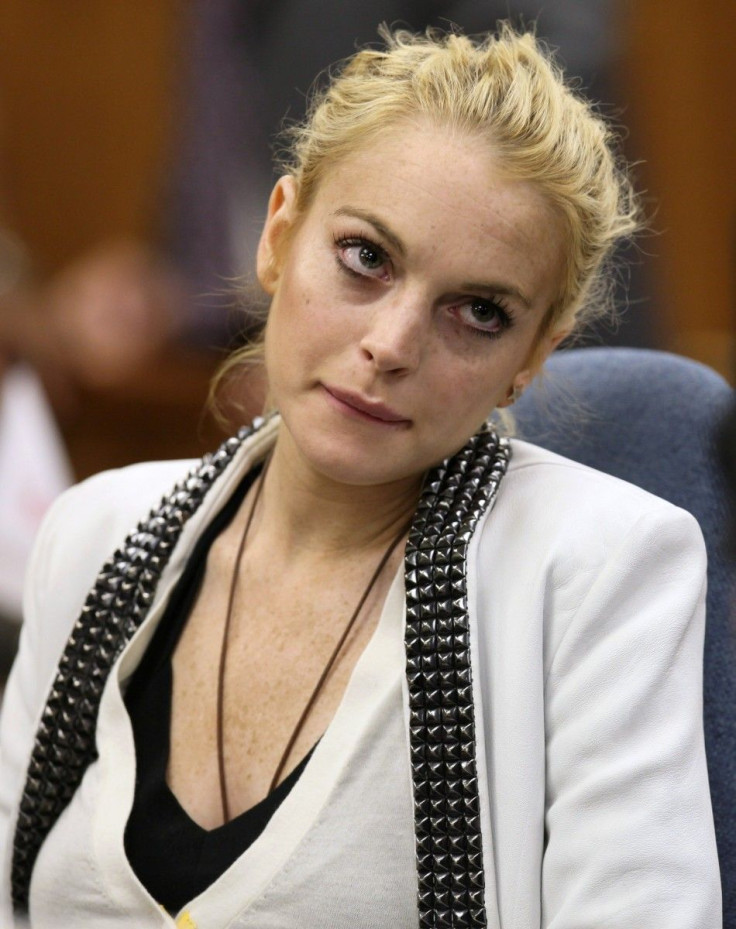 Actress Lindsay Lohan attends a progress report hearing for her 2007 drunk driving case at a courthouse in Beverly Hills
