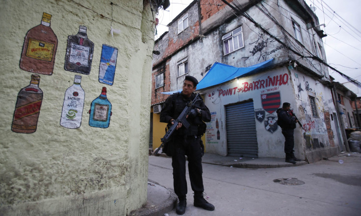 Policemen Patroling Manguinhos Slums In Rio De Janeiro