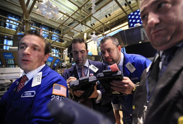 Traders work on the floor of the New York Stock Exchange