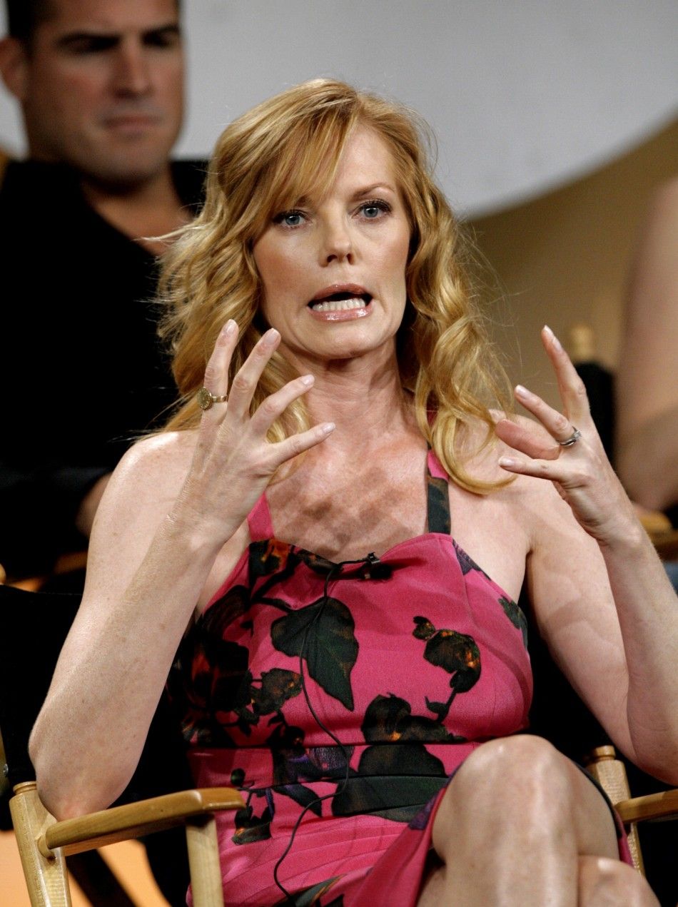 Marg Helgenberger gestures during a panel discussion in Pasadena