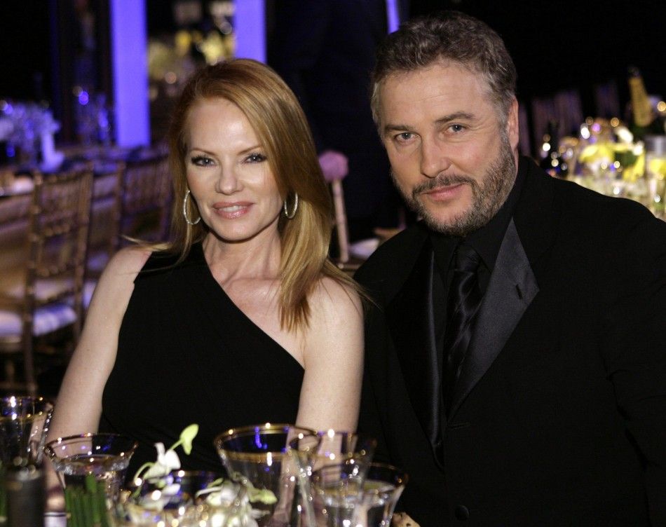 Marg Helgenberger and William Petersen from the cast of CSI sit together at the 14th annual Screen Actors Guild Awards in Los Angeles