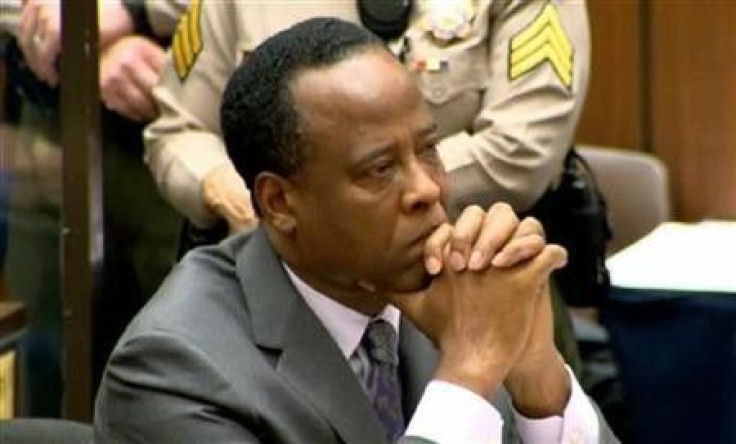 Dr. Conrad Murray listens as Judge Michael Pastor sentences him to four years in county jail for his involuntary manslaughter conviction of pop star Michael Jackson in this screen grab from pool video in Los Angeles