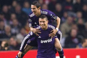 Real Madrid's Ronaldo and di Maria celebrate a goal against Ajax Amsterdam during their Champions League Group G soccer match in Amsterdam.