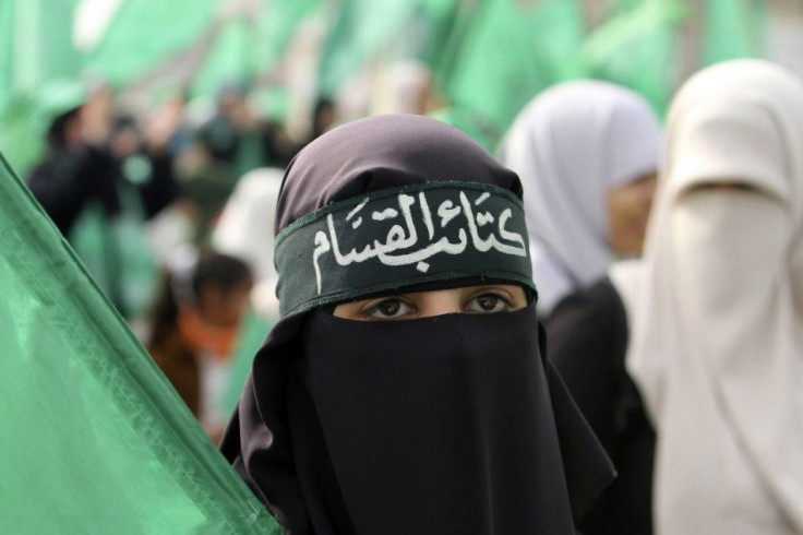 A Hamas supporter attends a rally in Gaza City