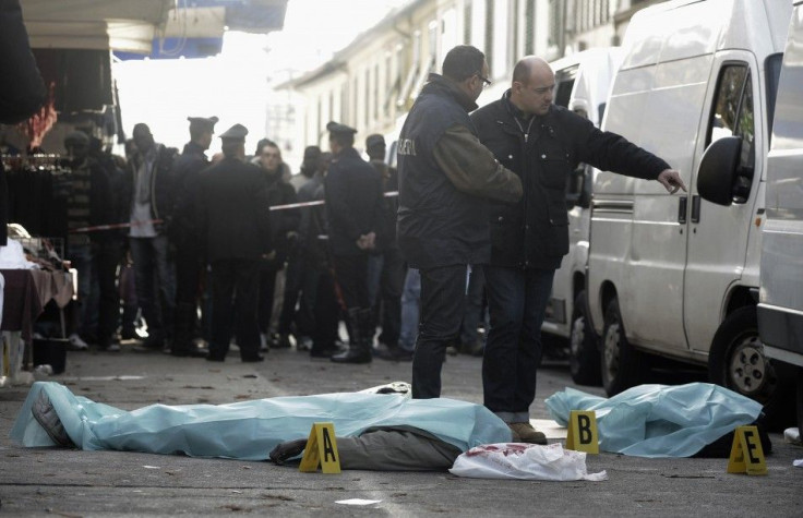 Two Senegalese vendors lie dead on the ground in downtown Florence