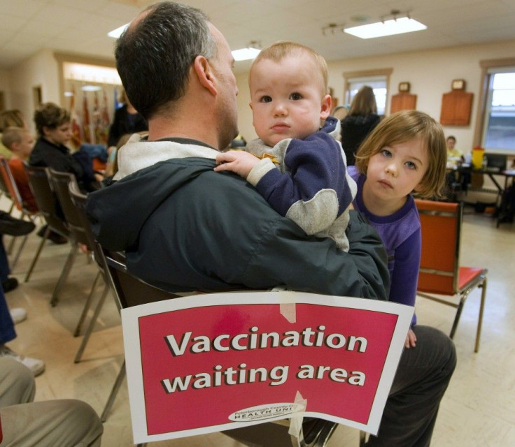 The French family from waits for H1N1 vaccinations at clinic in Lakefield Ontario