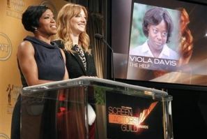 Actresses Regina King (L) and Judy Greer announce Viola Davis as outstanding performance by a female actor in a leading role nominee for her work in &#039;&#039;The Help&#039;&#039; for 18th Annual Screen Actors Guild Awards in West Hollywood
