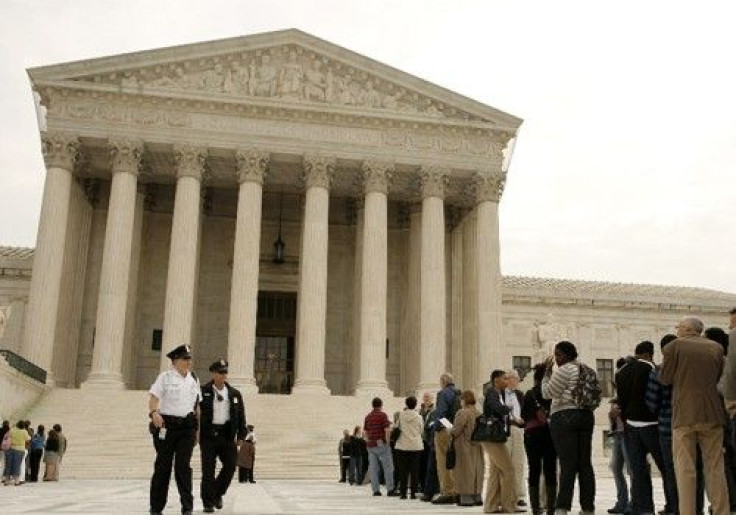 People queue to get into the Supreme Court in Washington