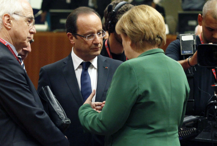 French President François Hollande and German Chancellor Angela Merkel at a summit in Brussels Friday 