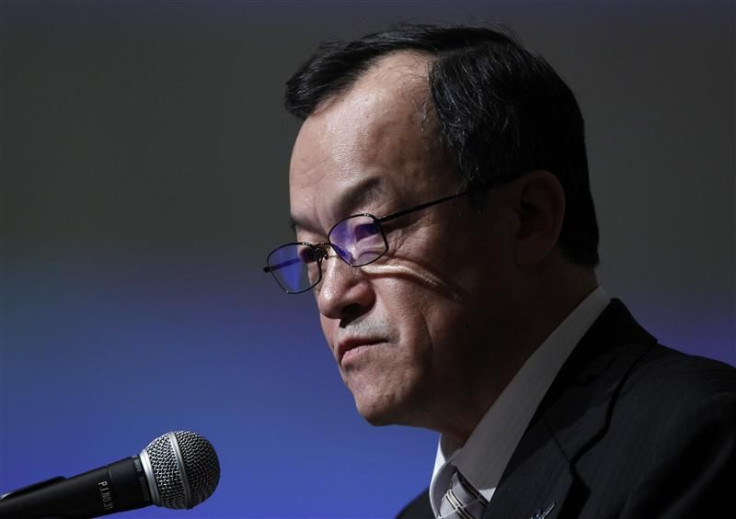 Olympus Corp President Takayama speaks at a news conference in Tokyo