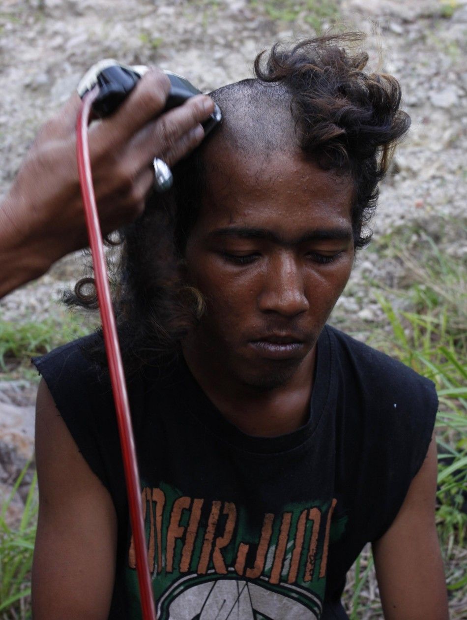 Indonesian Youths Heads Shaved for Moral Training