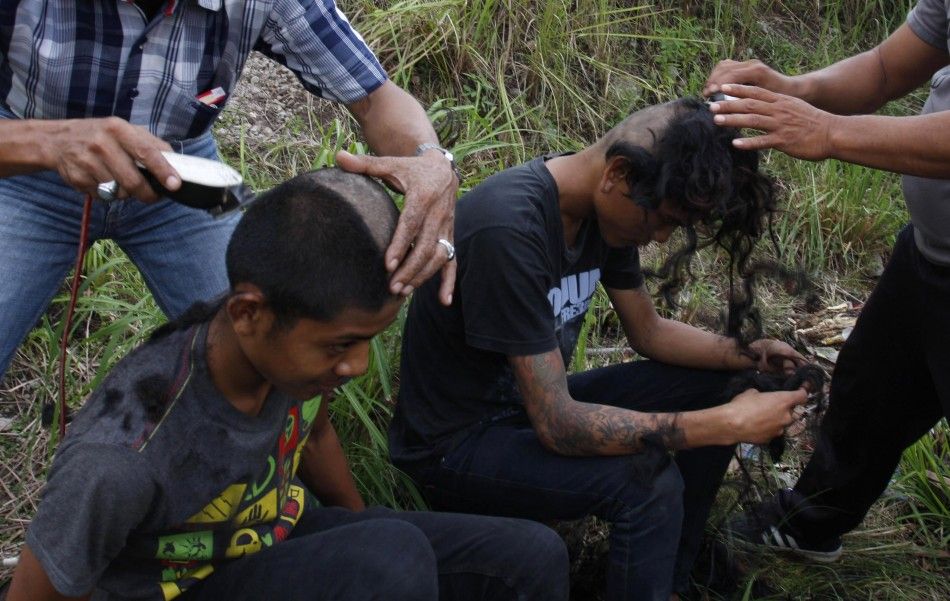 Indonesian Youths Heads Shaved for Moral Training