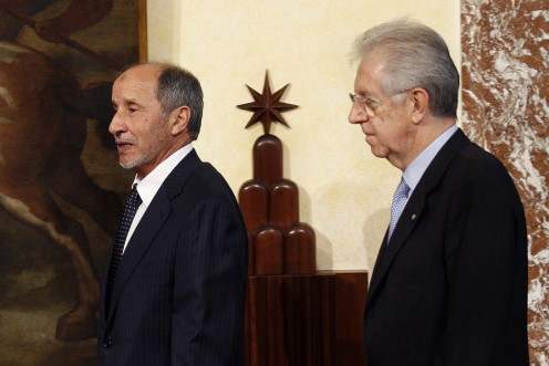 Italy&#039;s PM Monti and Libya&#039;s NTC Chairman Jalil arrive to attend a news conference in Rome