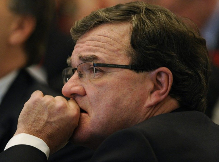 Canadian Finance Minister Flaherty waits while being introduced at the Calgary Chamber of Commerce in Calgary