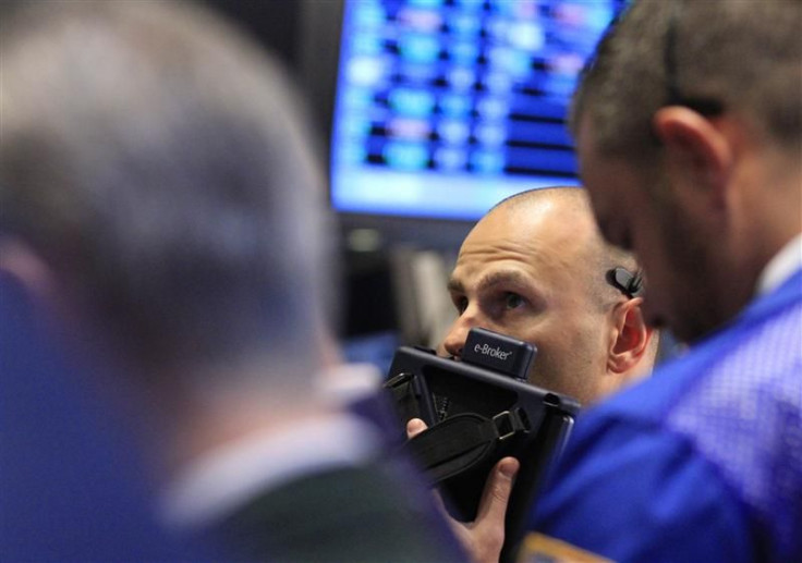 Traders work on the floor of the New York Stock Exchange