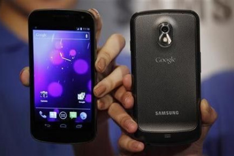 Models pose with the Galaxy Nexus, the first smartphone to feature Android 4.0 Ice Cream Sandwich and a HD Super AMOLED display, during a news conference in Hong Kong October 19, 2011.