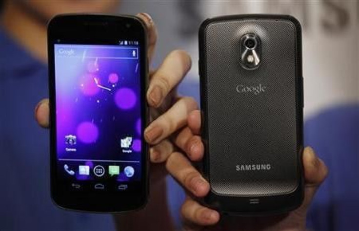 Models pose with the Galaxy Nexus, the first smartphone to feature Android 4.0 Ice Cream Sandwich and a HD Super AMOLED display, during a news conference in Hong Kong October 19, 2011.